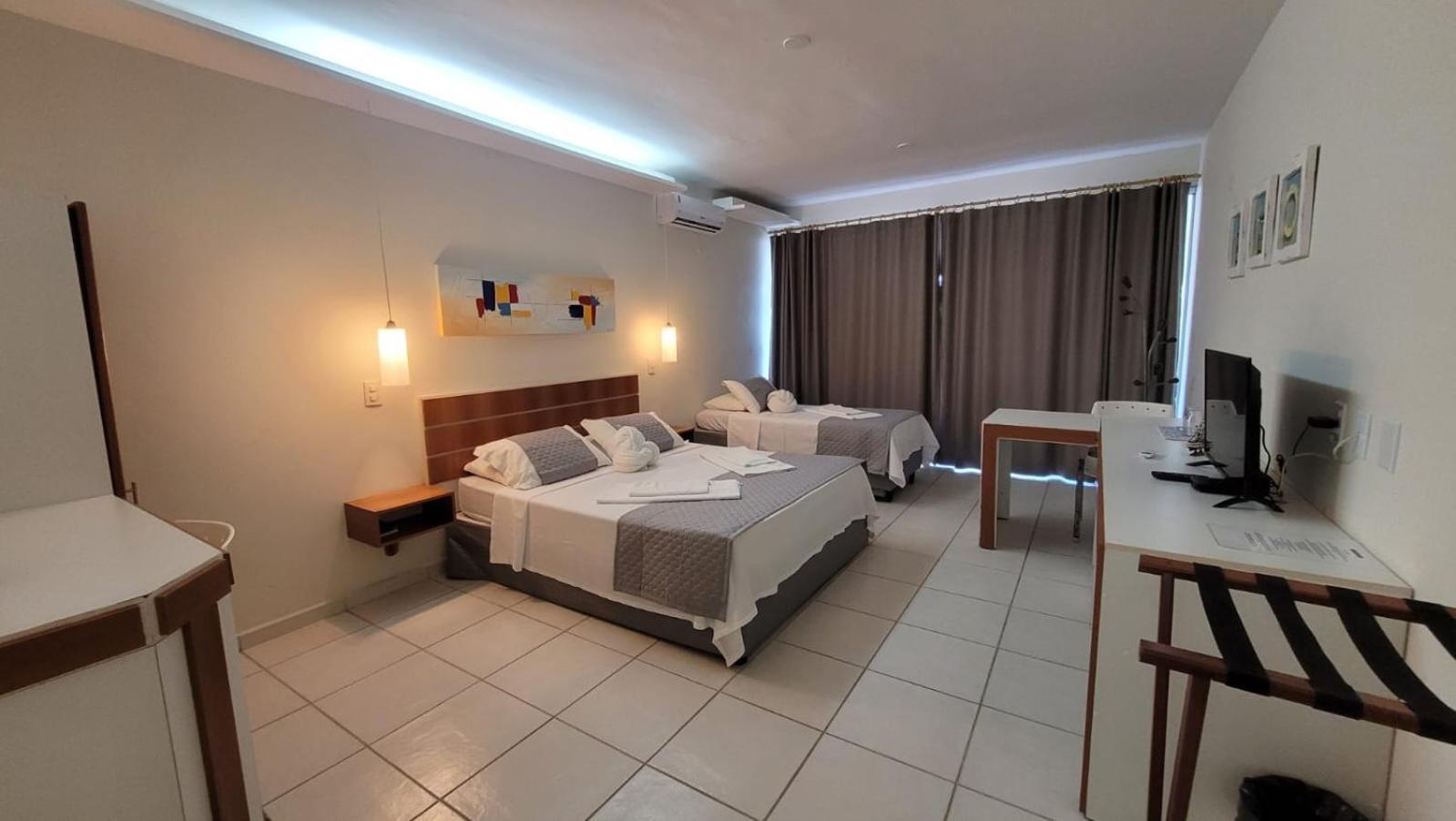 Quarto Familiar com Vista Mar